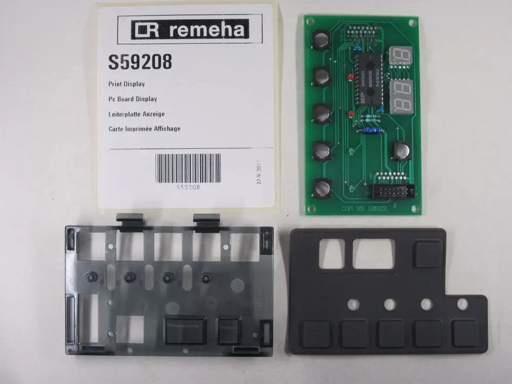 Remeha Display-Komponenten bestehend aus einer gedruckten Schaltung, einer transparenten Abdeckung und einer Tastenblende zur Anzeige- und Steuerungseinheit.